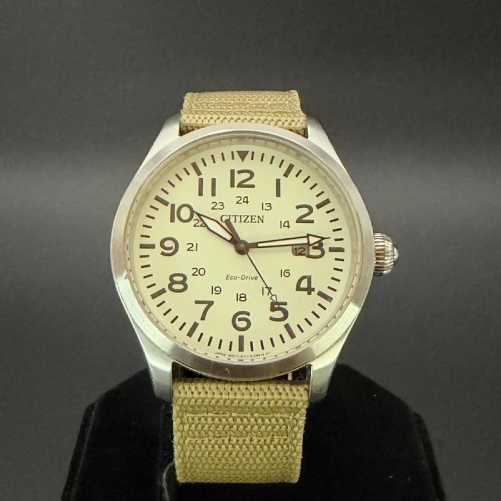 Citizen Eco-Drive E111 esfera crema NATO